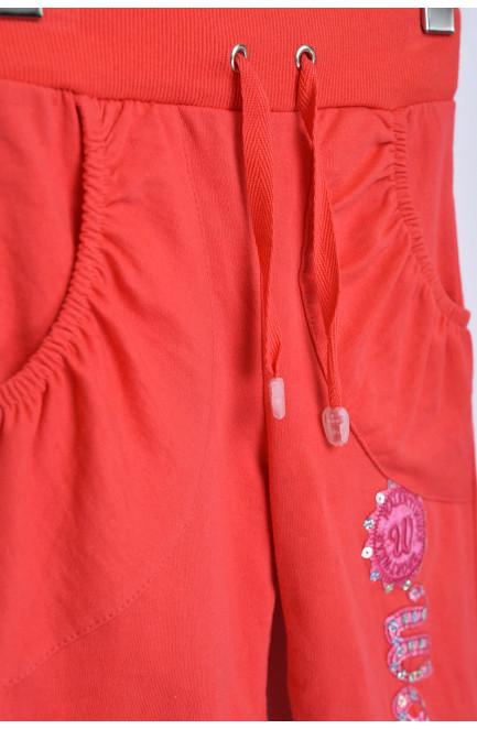 Штани дитячі дівчинка червоного кольору з написом 153656L