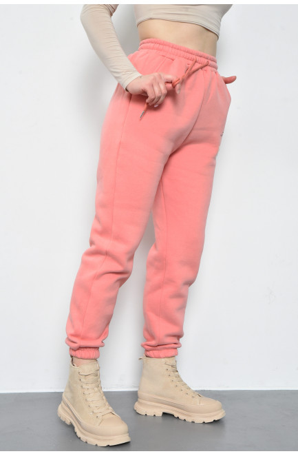 Спортивні штани жіночі на флісі персикового кольору 168669L