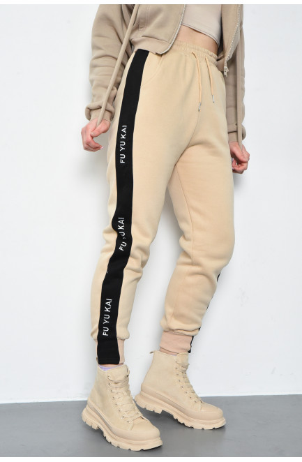 Спортивные штаны женские на флисе бежевого цвета 168670L