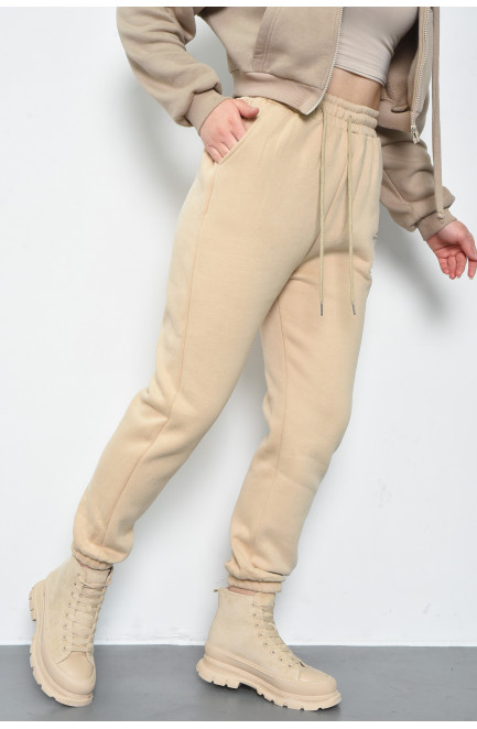 Спортивные штаны женские на флисе бежевого цвета 168671L