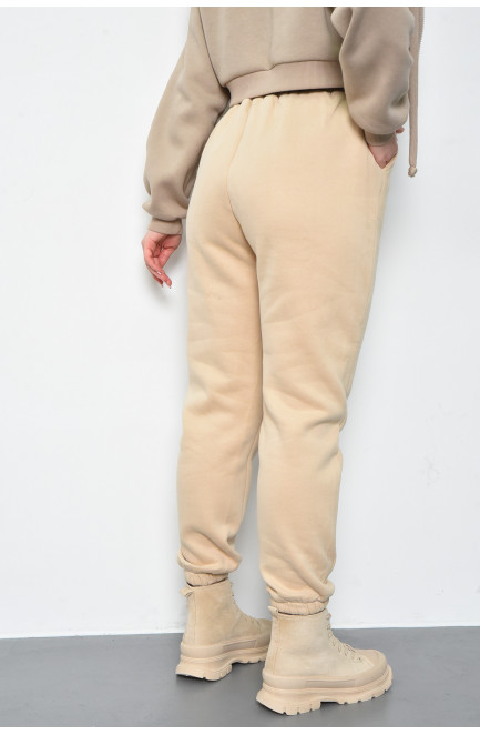 Спортивные штаны женские на флисе бежевого цвета 168671L