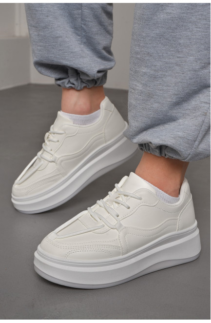 Кросівки жіночі білого кольору на шнурівці 176752L