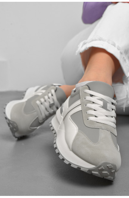 Кросівки жіночі сірого кольору з білим на шнурівці 176872L
