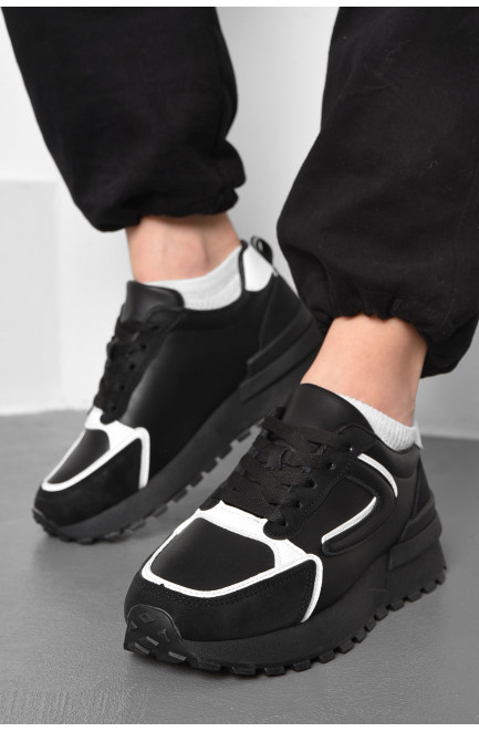 Кросівки жіночі чорного кольору з білим на шнурівці 176874L