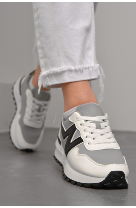 Кросівки жіночі сірого кольору з білим на шнурівці 176877L