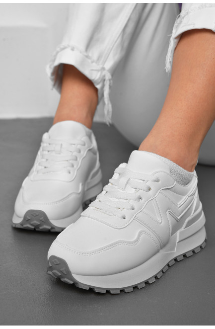 Кросівки жіночі білого кольору на шнурівці 176880L
