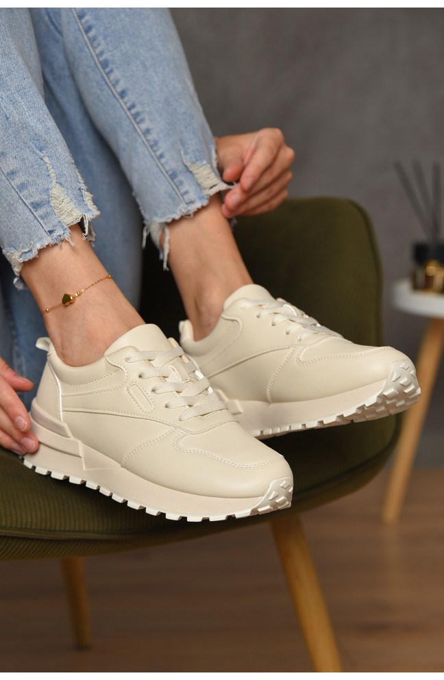 Кроссовки женские бежевого цвета на шнуровке 176882L